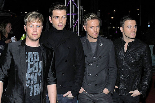 Irish pop stars Westlife have tried to dispel reports about an impending